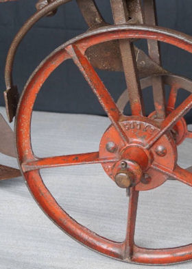 Detail of the plough after cleaning, with original paint layers preserved